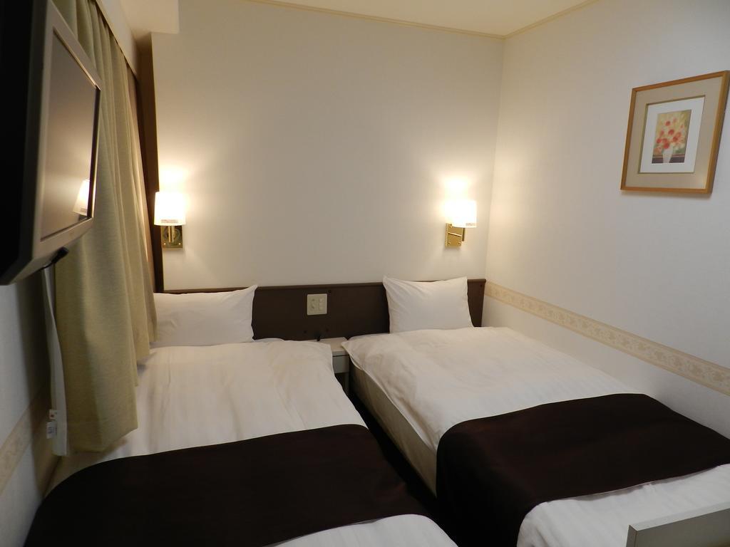 Hotel Check In Matsuyama à Matsuyama  Chambre photo