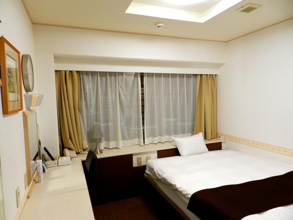 Hotel Check In Matsuyama à Matsuyama  Extérieur photo