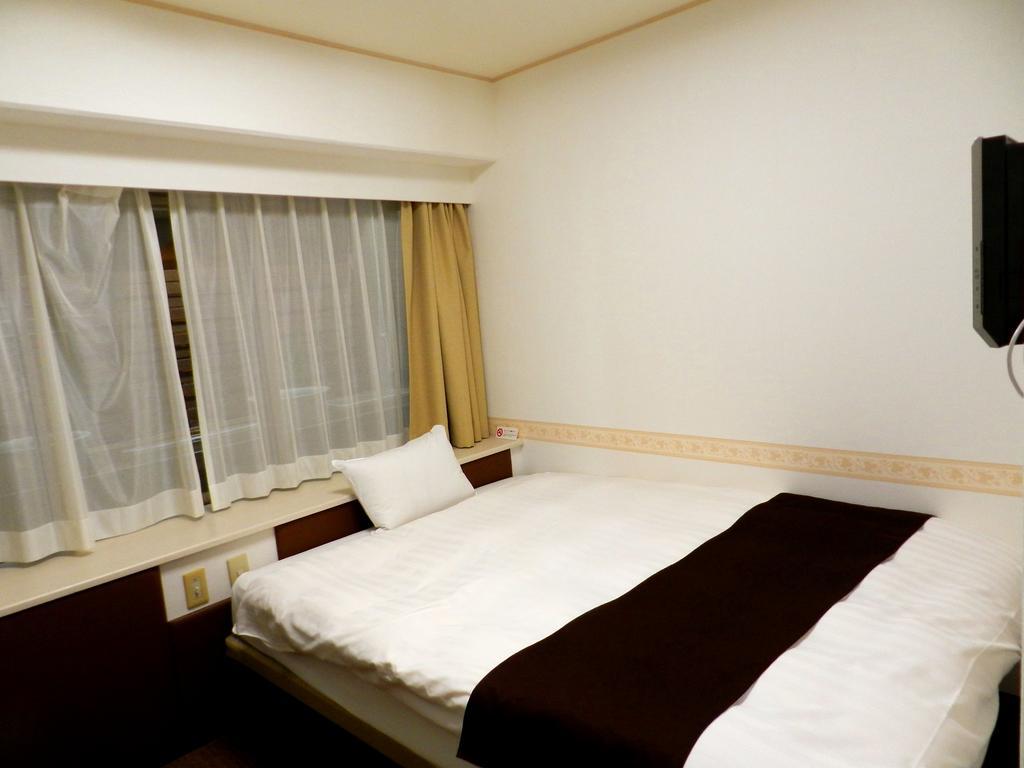 Hotel Check In Matsuyama à Matsuyama  Extérieur photo