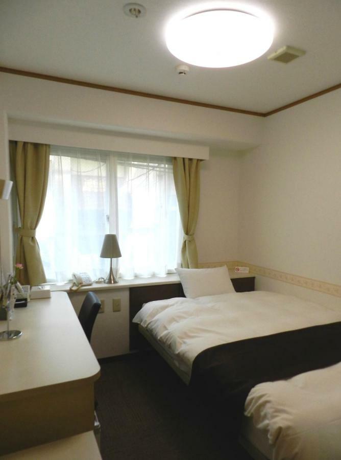 Hotel Check In Matsuyama à Matsuyama  Extérieur photo